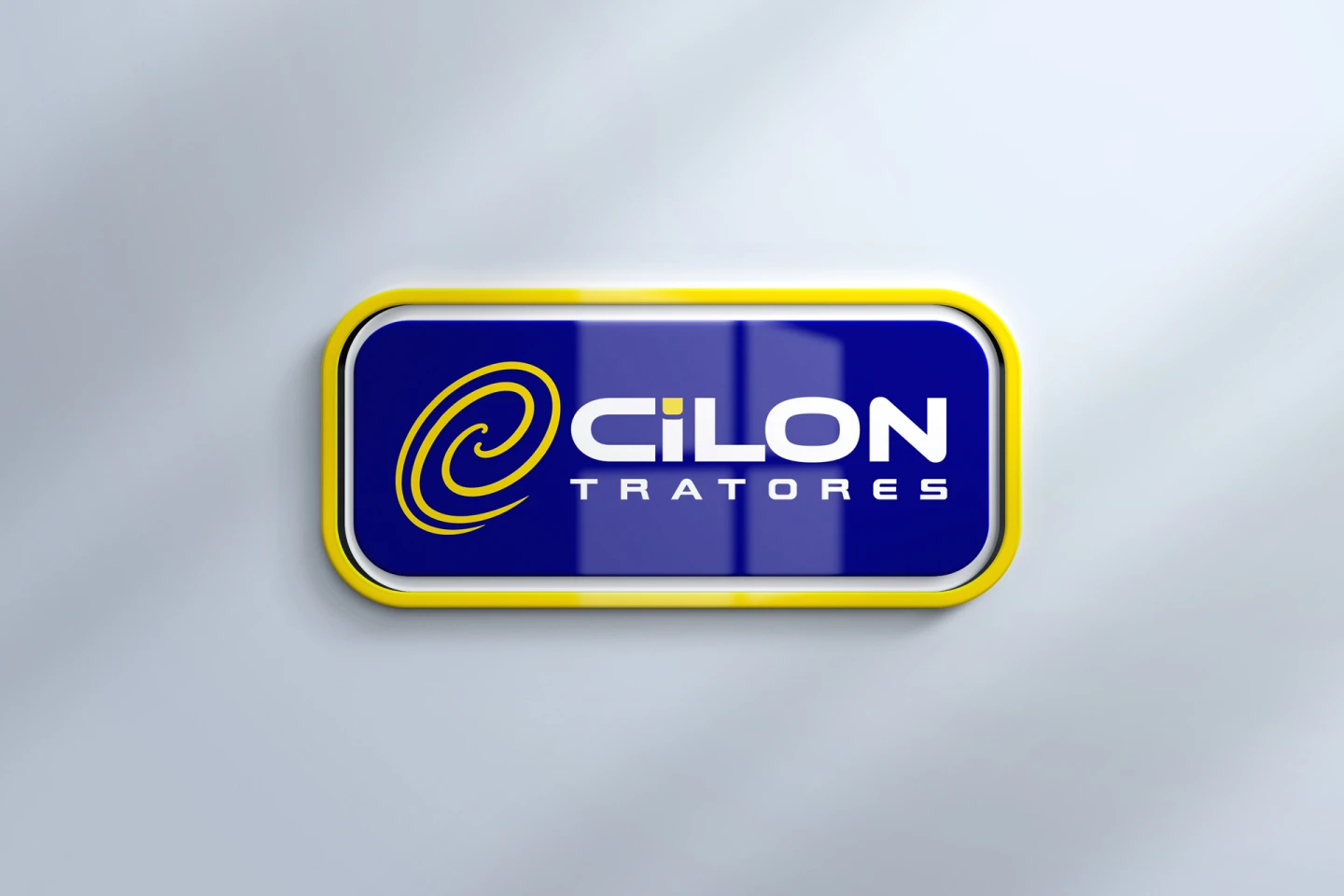 Logomarca da Cilon Tratores em placa azul com moldura amarela, criação de logo pela Fox Creative